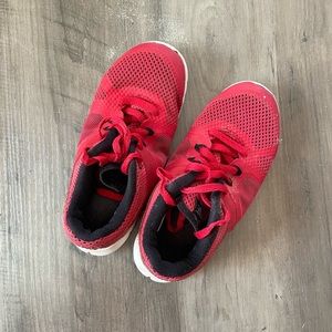 Nikes w/ some wear (moderate); lots of use left in them! Sz 13 kids.
